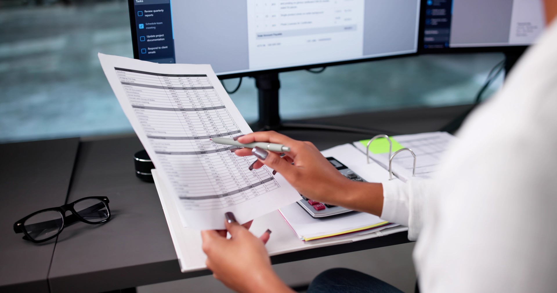 Top Accountant Woman Doing Tax Calculation